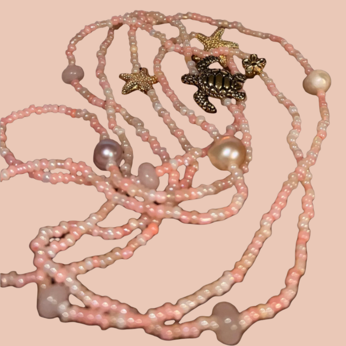 coral beads with gold sea charms