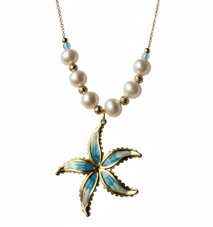 Necklace with a blue and gold starfish pendant