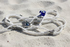 White waistbeads with evil eye hamsa hand and glass heart and accents of silver beads