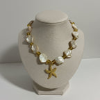 Abalone shells, yellow glass beads and a gold starfish pendant