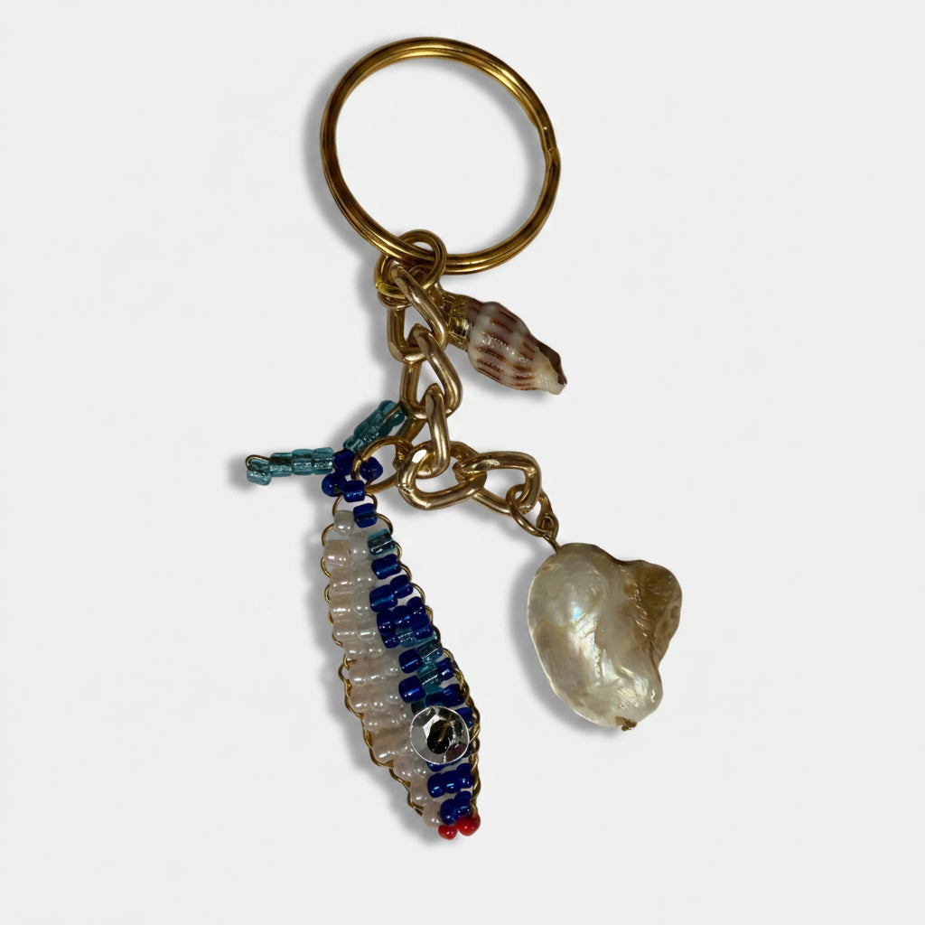 Gold keychain with abalone shell and beaded fish charm