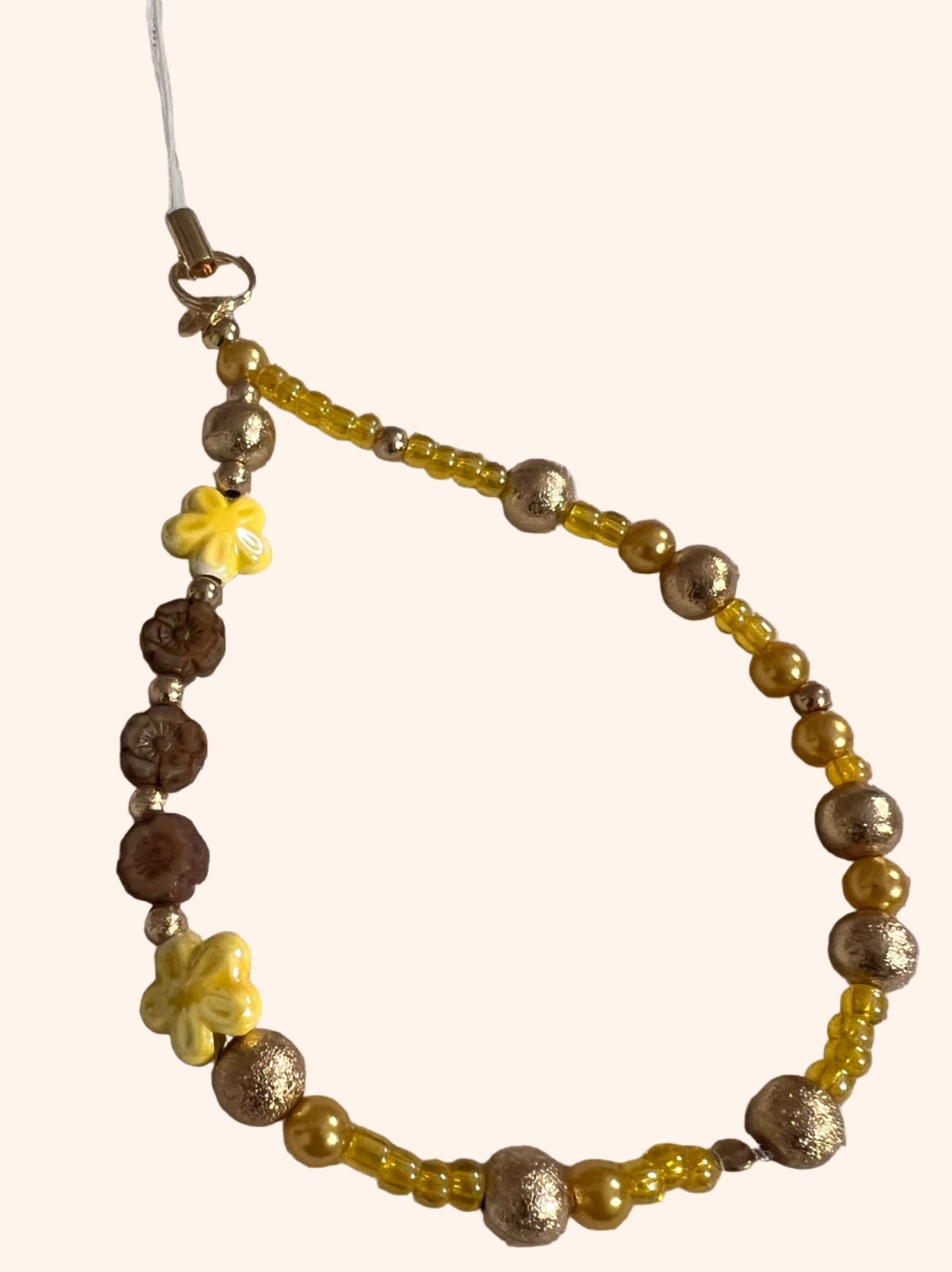 Beaded bracelet with yellow flowers amber beads and porcelain yellow flowers