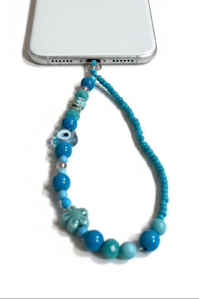 Beaded phone wristlet with blue and evil eye glass beads 