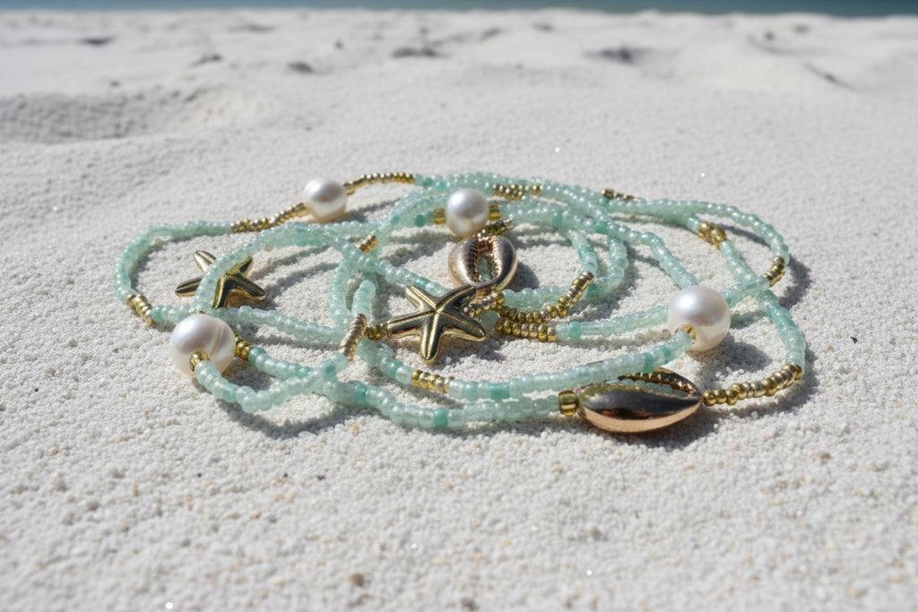 Seafoam colored waistbeads with pearl accents and gold starfish 