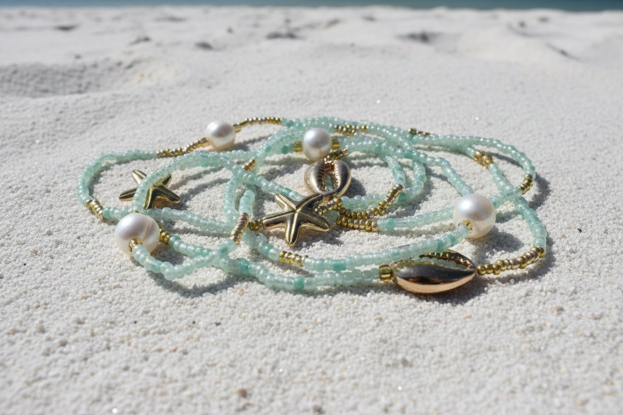Seafoam colored waistbeads with pearl accents and gold starfish 