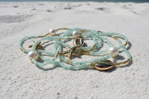 Seafoam colored waistbeads with pearl accents and gold starfish 