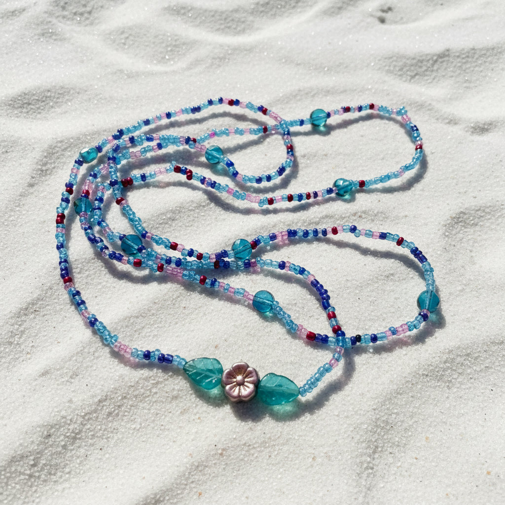 This set offers a beautiful blend of teal, purple, and blue beads. Accented with purple reflective flowers surrounded with leaves! So comfy, you won't even feel like you're wearing them!
