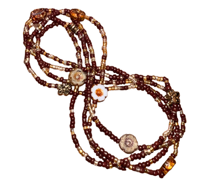 brown and gold seed bead waistbeads with floral charms