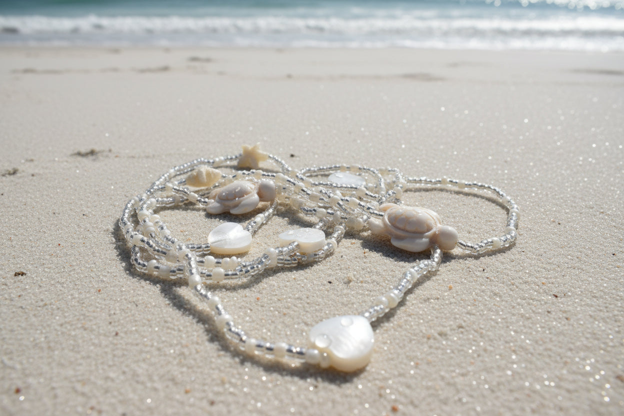Pearl waistbeads with pearl hearts and starfish and ivory colored turtles