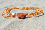 orange and cream waist beads with coral hearts and orange turtles