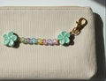purse charm that spells florida with colorful repurposed beads