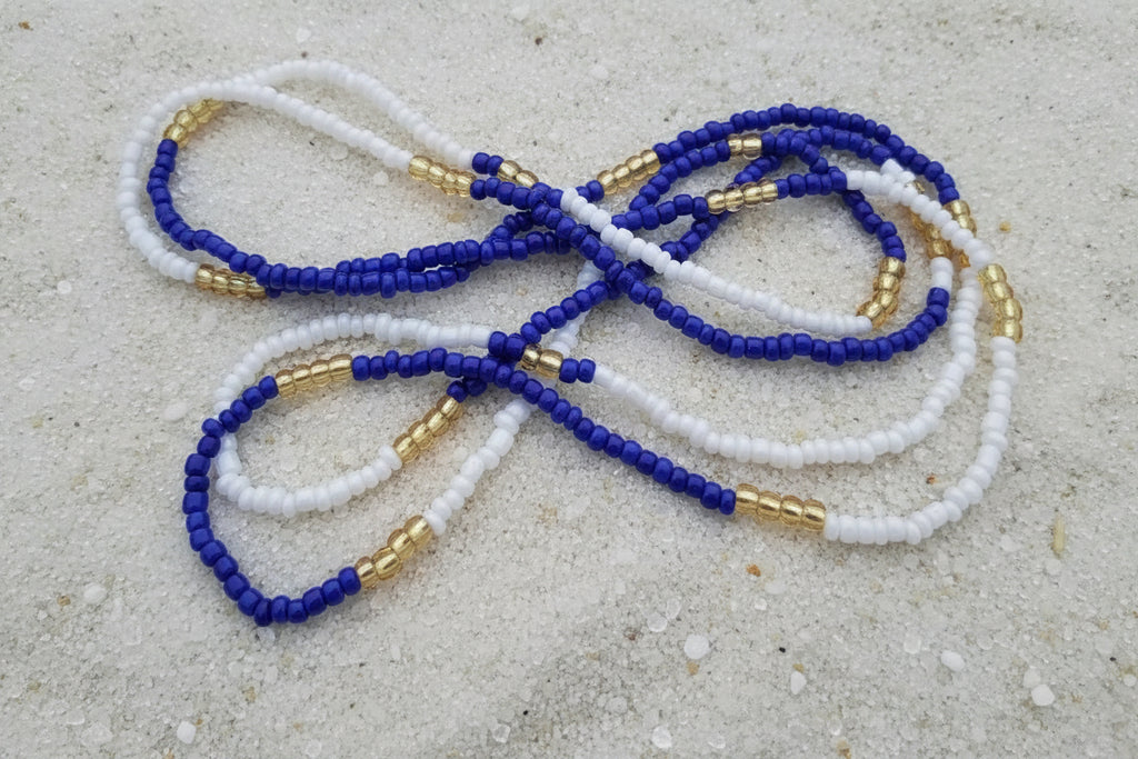 blue,white, and gold elastic waistbeads made by gabi decor studio