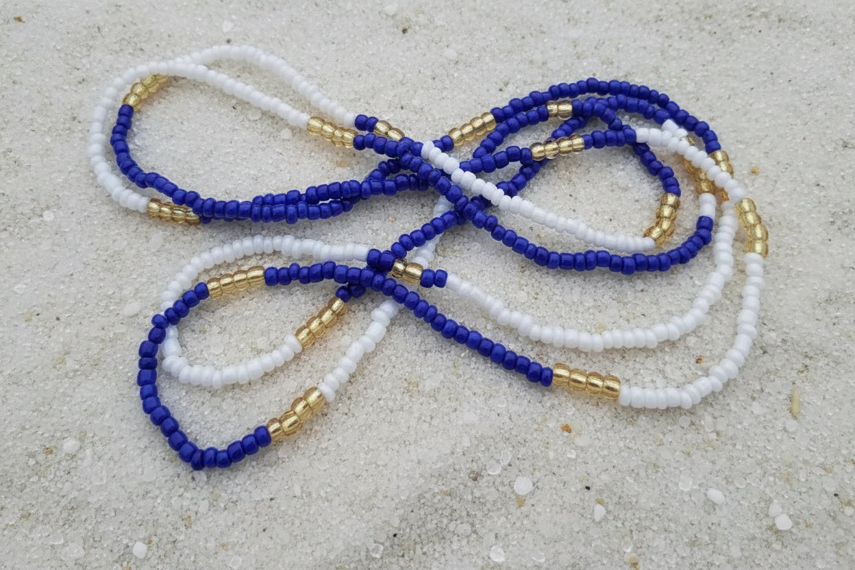 blue,white, and gold elastic waistbeads made by gabi decor studio
