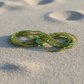 Beaded waistbeads with gold and green seed beads