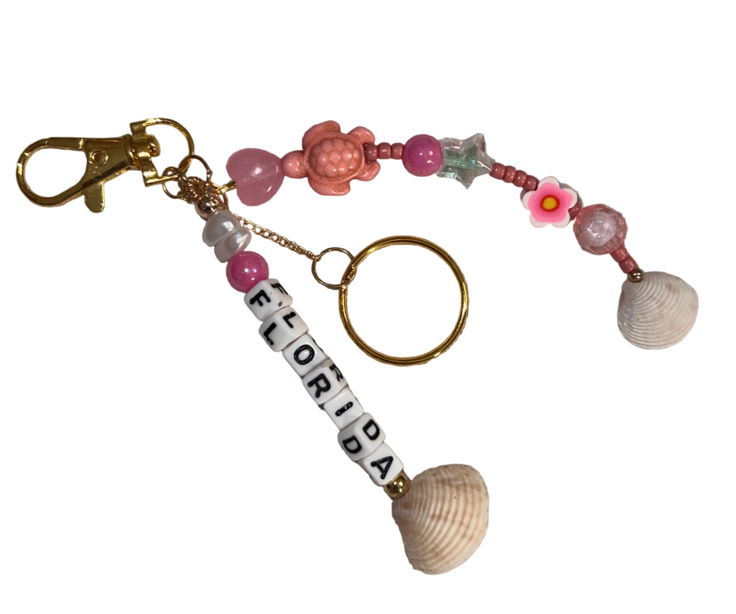 Keychain with 'Florida' charm and pink decorative beads and charms